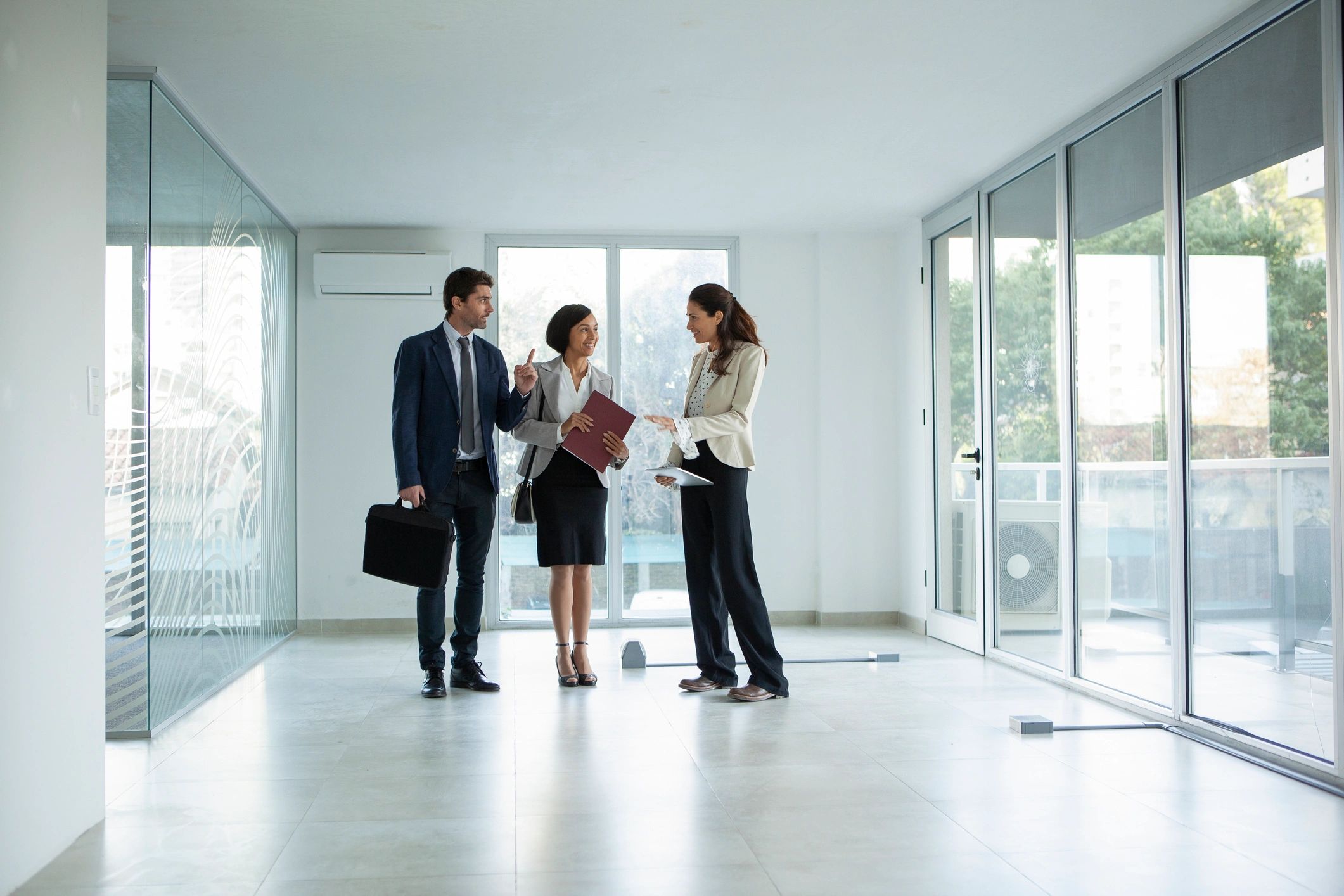 Real estate team meeting with clients