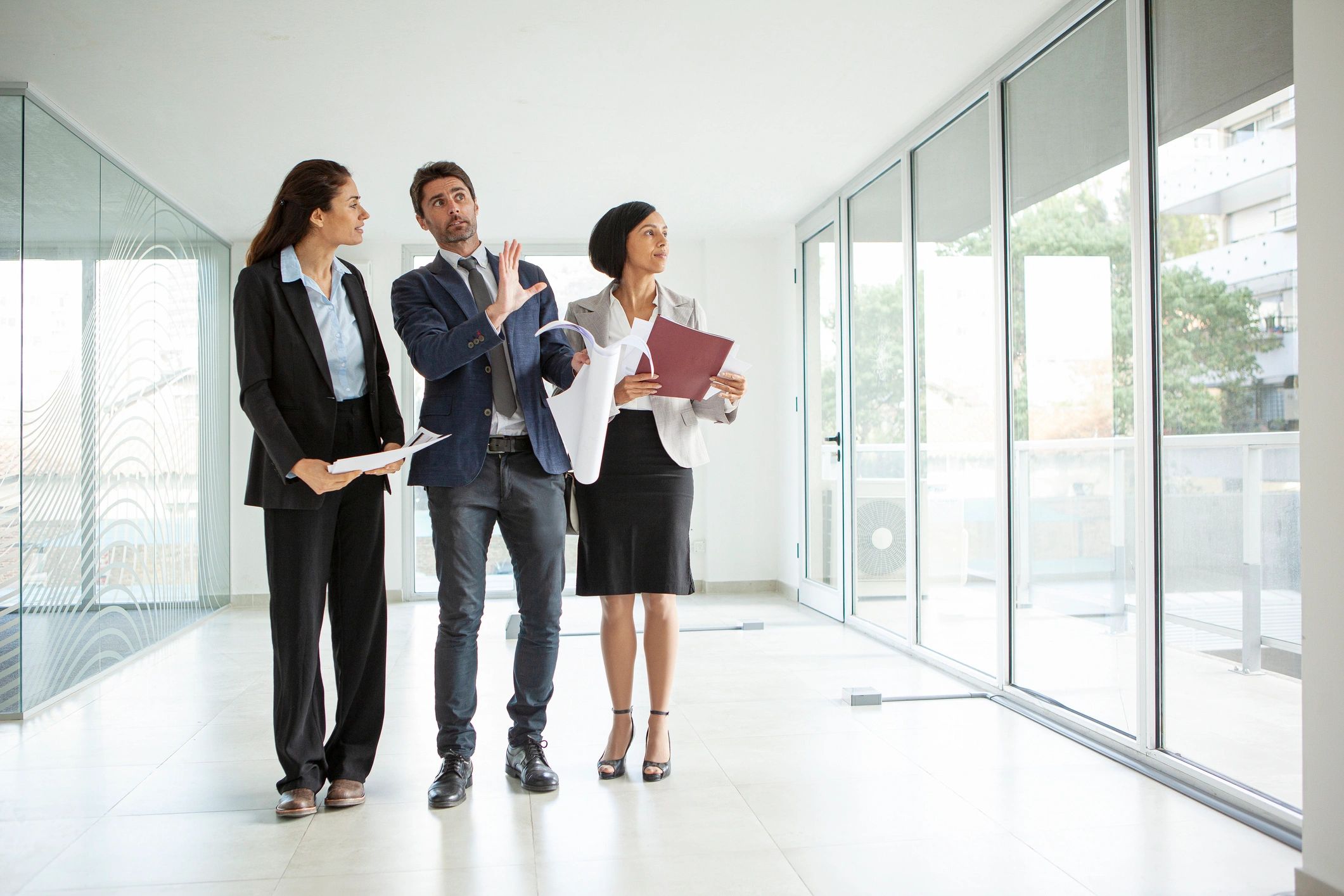 Professional real estate team collaborating in an office