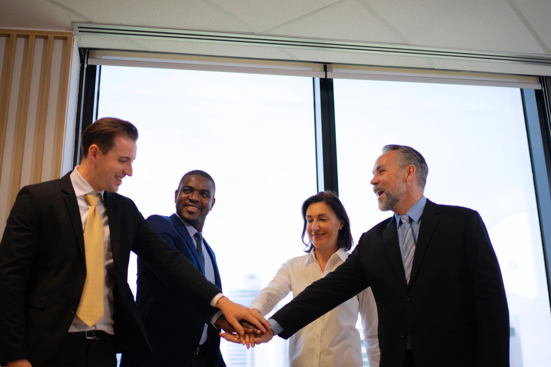 Professional real estate team collaborating in an office